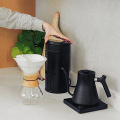 A Wilfa Uniform coffee grinder with precision stainless steel flat burrs, digital timer, scales, and compact design for consistent, uniform coffee ground